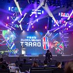 NBA 2K League CEO Andrew Perlmutter on stage in front of a large screen featuring the NBA 2K League Draft logo.